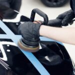 Professional,Car,Polishing.,Worker,With,Orbital,Polisher,In,Auto,Repair